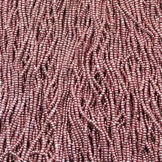 13/0 Charlotte Cut Preciosa (Czech) Bead Metallic Pink Terra Strung