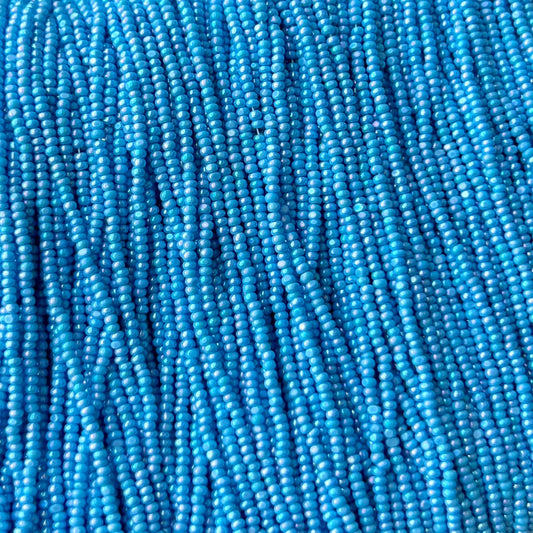 13/0 Charlotte Cut Preciosa (Czech) Bead Opaque Light Blue AB Strung