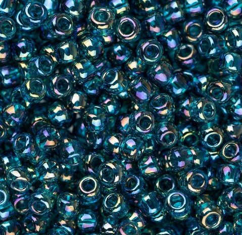 Toho Round 15/0, 8.9g vial - Transparent Rainbow Teal